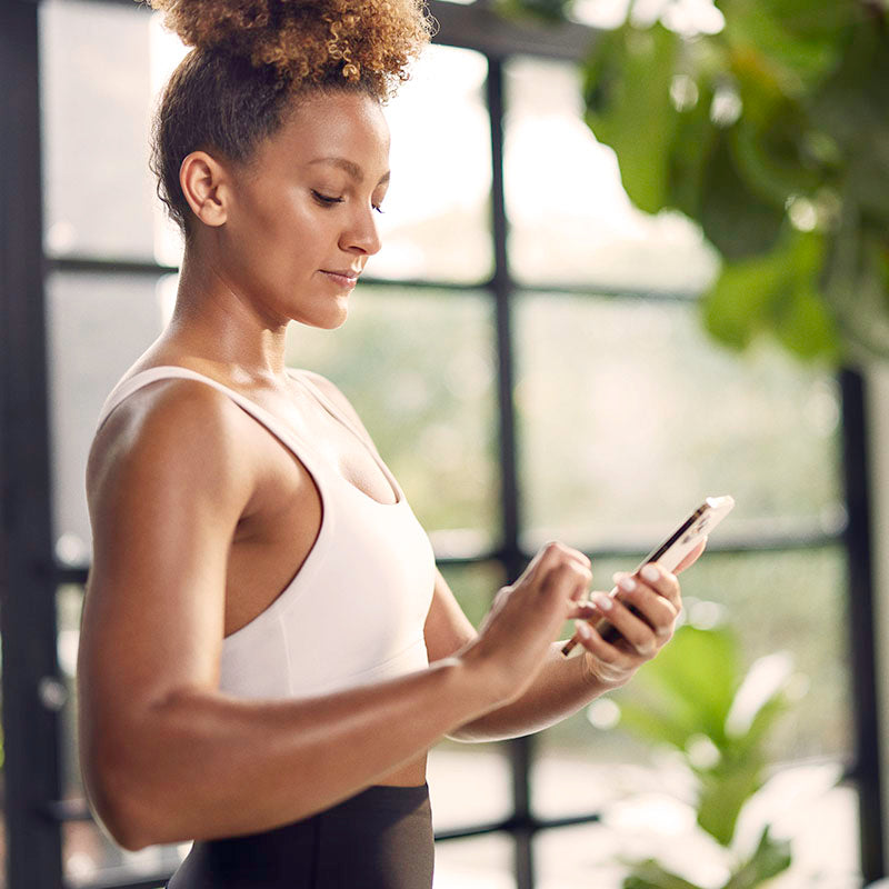 Woman using the V app on her phone